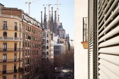 a view of a city from a window of a building at You Stylish Sagrada Familia Apartments in Barcelona