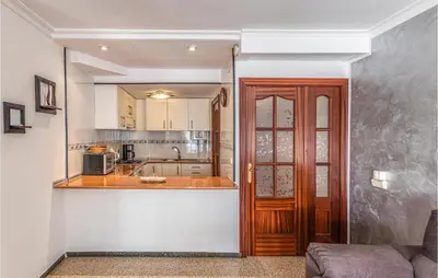 a kitchen with a sink and a counter top at Gorgeous Apartment In Pineda De Mar in Pineda de Mar