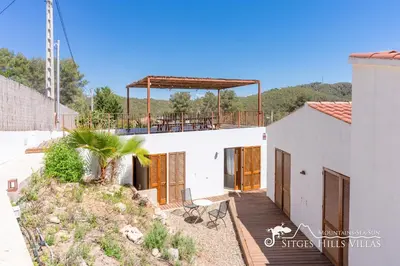 two beds sitting next to each other in a room at Villa Falco is a beautiful single storey holiday villa with private pool in Viladellops