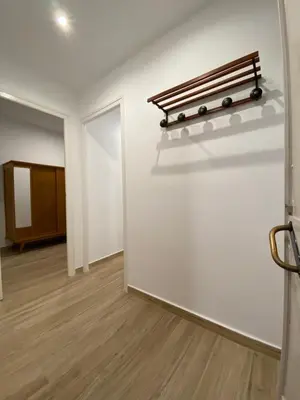 an empty room with a bench on a wall at VIU BARCELONA BERTRAN in Barcelona