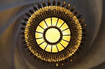 a chandelier hanging from a ceiling in a building at FELIP - Spacious and quiet apartments & one with Terrace in Barcelona