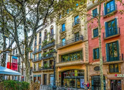 a tall building with balconies on a city street at GIRONA - Modernist apartments next to Paseo de Gracia in Barcelona