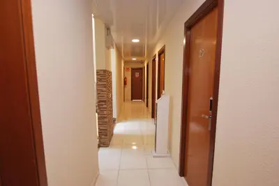 a corridor of a hallway with at Hotel Tres Leones in Vilassar de Mar