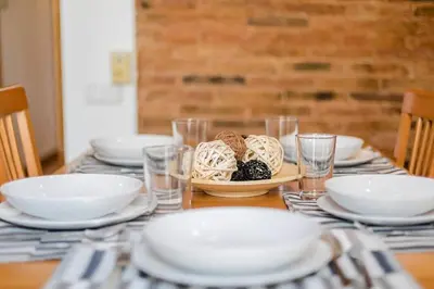a table with plates and bowls of food on it at Vive Como Un Barcelons in Barcelona