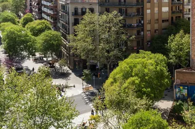 an overhead view of a city street with trees at Penthouse Apartment with Terrace in Barcelona City Center in Barcelona