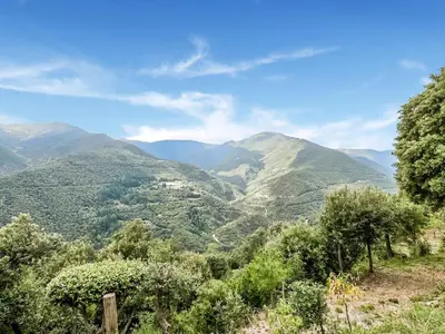 a view of a valley with mountains in the background at Holiday Home Montseny with Pool in Montseny