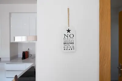a no sign hanging on a wall in a kitchen at Maka beach apartment v in Castelldefels