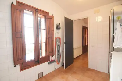 a bathroom with a towel rack and a window at Magic Place in Barcelona