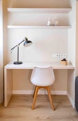 a white desk with a lamp and a white chair at Barcelona Touch Apartments - Campalans in Hospitalet de Llobregat