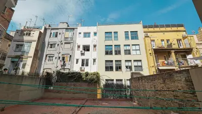 a group of tall buildings in a city at Bed&BCN Gracia III in Barcelona