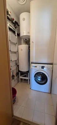 a kitchen with a refrigerator and a counter top at Avenida Diagonal distrito tecnológico 22 arroba - Angeles Terraza in Barcelona