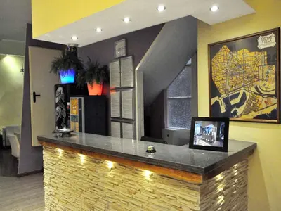 a bar in a restaurant with a tile counter at BARCELONA GOTIC Guesthouse in Barcelona