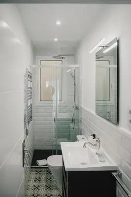a bathroom with a sink and a shower and a toilet at BBarcelona Fira Superior Flats in Barcelona