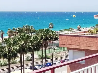 a view of the ocean from the balcony of a building at terraza al mar in Pineda de Mar
