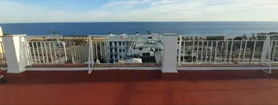 a balcony with a view of the ocean at terraza al mar in Pineda de Mar