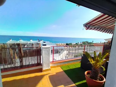 a balcony with a view of the ocean at terraza al mar in Pineda de Mar
