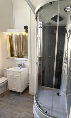 a bathroom with a shower and a toilet and a sink at Barcelona Central Apartments in Barcelona