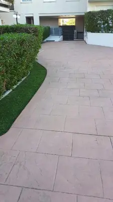a brick walkway in front of a building at Casa Ana -Cubelles in Cubelles