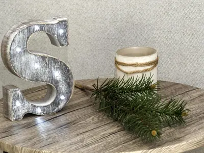 a silver letter s with a christmas tree on a table at Sitges Spaces Sea View Paradise- 2 Bedrooms, 2 Bathrooms, Terrace, Amazing Sea Views in Sitges