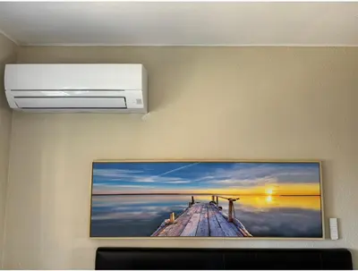 a picture of a painting of a pier on a wall at Habitación Amaya 2 in Las Corts