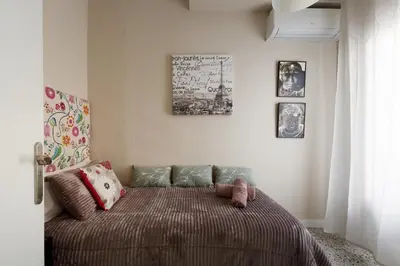 a bedroom with a bed in a room at Mercat Sant Antoni 1 in Barcelona