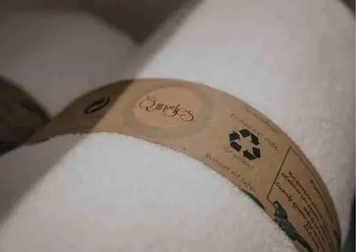 a knife with a sticker on the arm of a person at Les Quingles in Calders