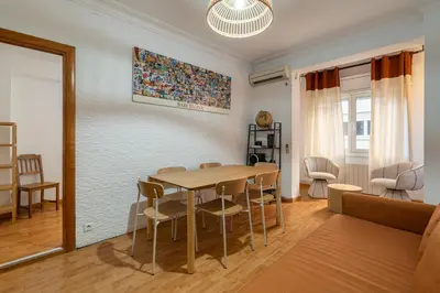 a dining room with a table and chairs in a room at Stay U-nique Apartments Salva II in Barcelona