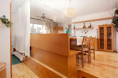 a kitchen and dining room with a table and chairs at Atic Gaudi-Gracia in Barcelona
