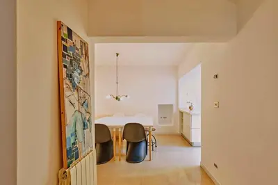 a dining room with a table and chairs in a room at Casa de Pueblo junto Barcelona Centro in Vilassar de Dalt