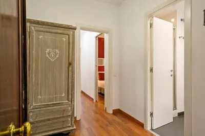 an empty room with a door and a bedroom at Alcam Enamorats in Barcelona