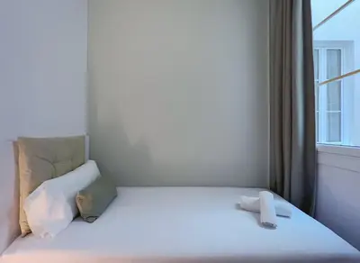 a bed in a room with a window at Stay U-nique Apartments Vila de Gracia in Barcelona