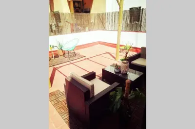 an aerial view of a patio with chairs and tables at M1 Cool Loft 1 min walk to metro 15 min center by metro in Esplugues de Llobregat