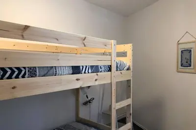 a couple of bunk beds in a room at M4 Cool Terrace. 1 min to metro. 15 min to center in Esplugues de Llobregat