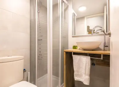 a bathroom with a shower and a sink at Find Calm at this cozy City Sanctuary with terrace in Barcelona