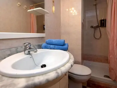 a bathroom with a sink and a toilet and a shower at Apartment Sun and Beach by Interhome in Cunit