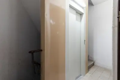 a hallway with a white door in a room at 1814 - AB Sagrada Família Cartagena in Barcelona