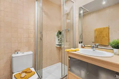 a bathroom with a shower and a sink at Lodging Apartments Villa de Gracia 2 bedroom cozy apartment in Barcelona