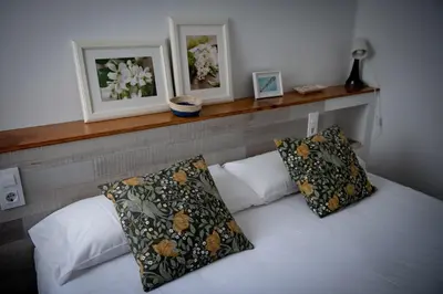 a bedroom with a bed with two pillows on it at Seneca7 near paseo de gracia in Barcelona