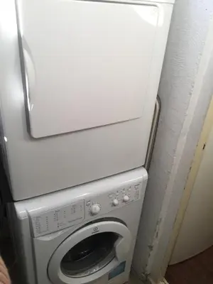 a washer and dryer in a room at APARTAMENTO BARCELONA in Barcelona