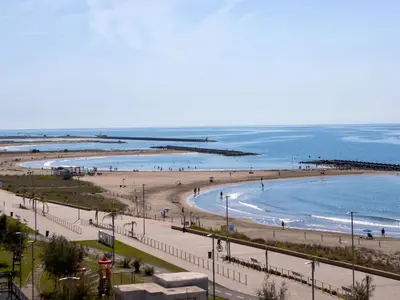 a view of a beach with people and the ocean at Apartment Blue Sea by Interhome in Cunit