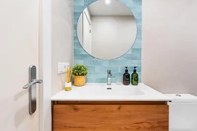 a bathroom with a sink and a mirror at Lodging Apartments Barceloneta Beach Studio 12 in Barcelona