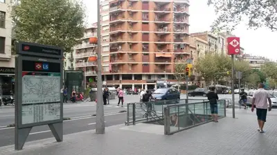 a busy city street with people walking on a sidewalk at Stay U-nique Apartments Villarroel in Barcelona