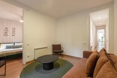 a living room with a couch and a table at Stay U-nique Apartments Sant Antoni in Barcelona