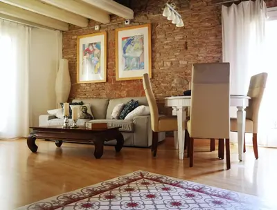a living room with a couch and a table at Stay U-nique Apartments Monec in Barcelona