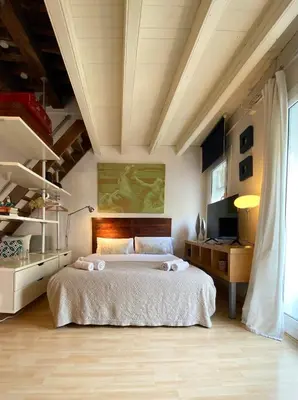 a bedroom with a large bed in a room at Stay U-nique Apartments Monec in Barcelona