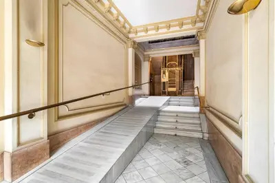 an empty hallway with stairs in a building at Stay U-nique Apartments Gran Via in Barcelona
