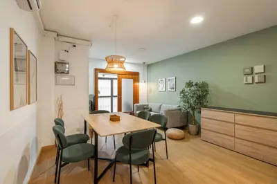 a dining room with a table and chairs at Stay U-nique Apartments Passatge de Font in Barcelona