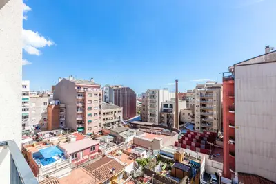 an overhead view of a city with tall buildings at Stay U-nique Apartments Industria in Barcelona