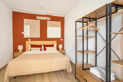 a bedroom with a bed and a bunk ladder at The Collection Barcelona - Paseo de Gracia 5BD and 3BTH for 10 with Terrace in Barcelona