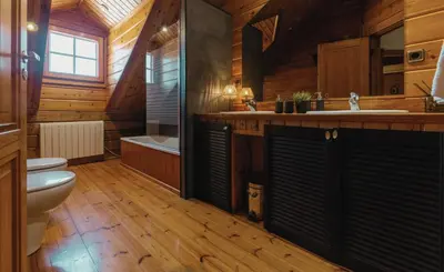 a bathroom with a toilet and a sink at Finland House Barcelona- Ideal familias in Argentona